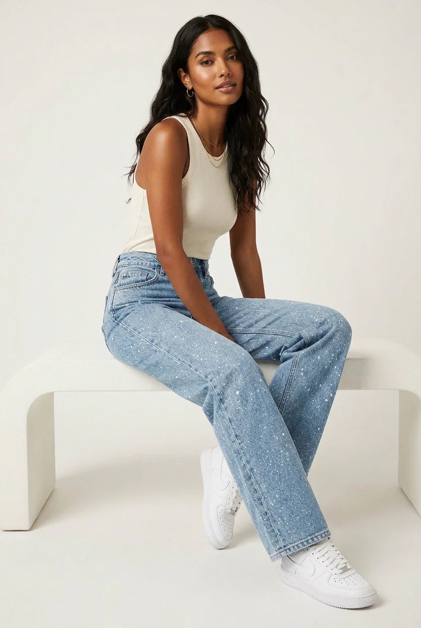 Trendy high-waist wide-leg women's jeans with sparkling glitter denim for a statement look.