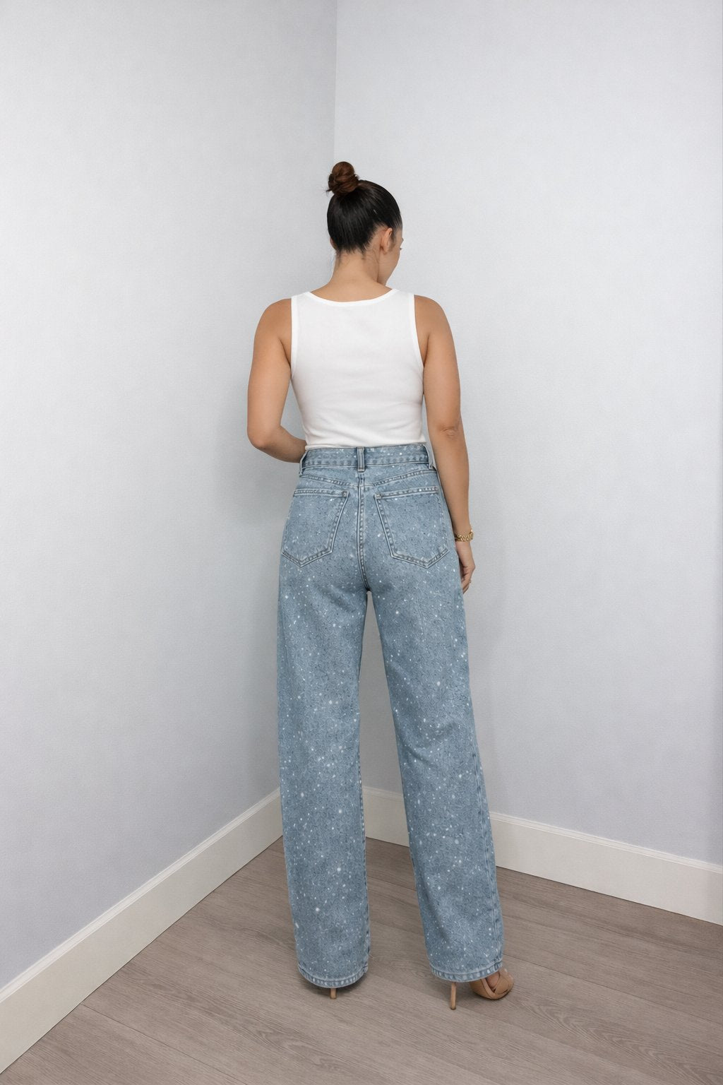 Stylish women's glitter denim jeans, high-waist & wide-leg, ideal for party wear & evening fashion.