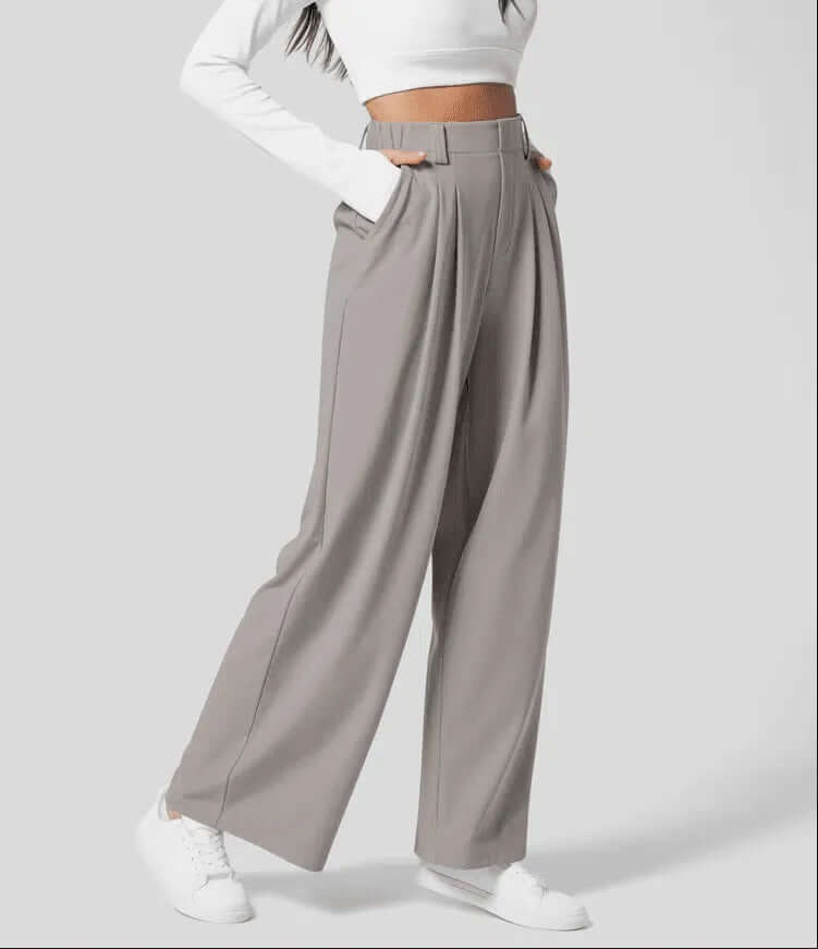 Elegant women's wide leg trousers with a high waist and tailored fit, ideal for sophisticated office wear.