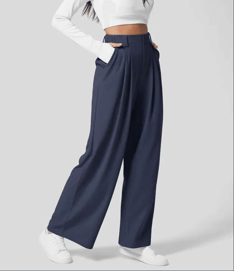 Comfortable women's wide leg pleated trousers featuring a high waist and tailored fit for all-day style.