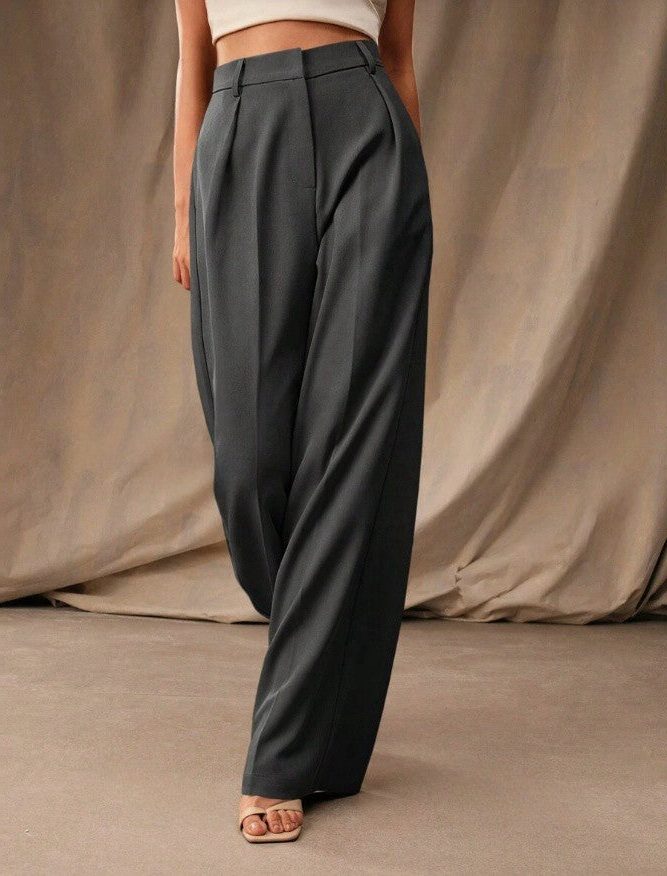 Stylish women's wide leg dress pants with a high waist, offering a versatile, tailored fit.