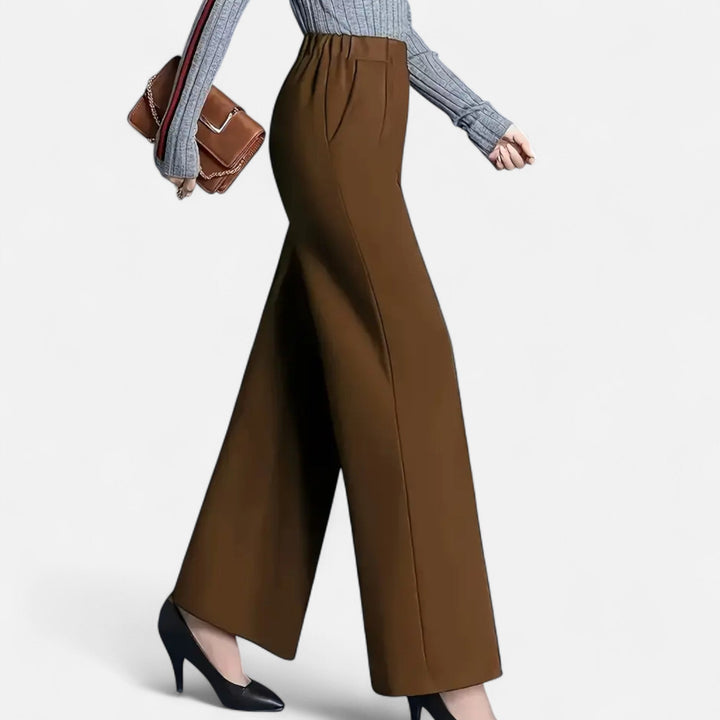 Stylish women's high-waist trousers with a wide leg, designed for elegant comfort and a relaxed fit.