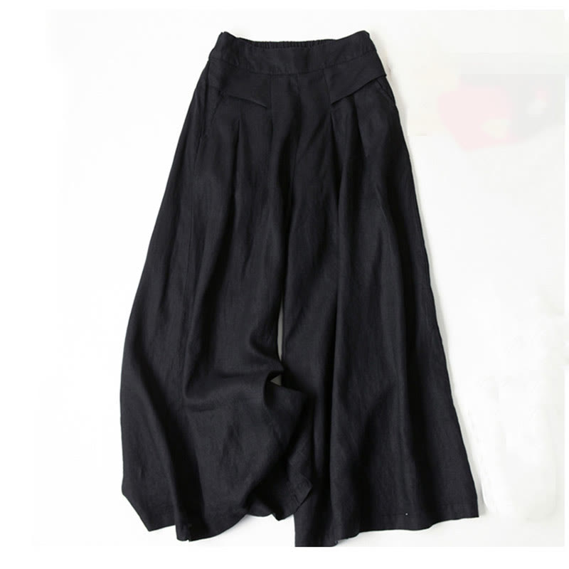 Elegant women's wide-leg trousers with a high waist, suitable for various occasions.