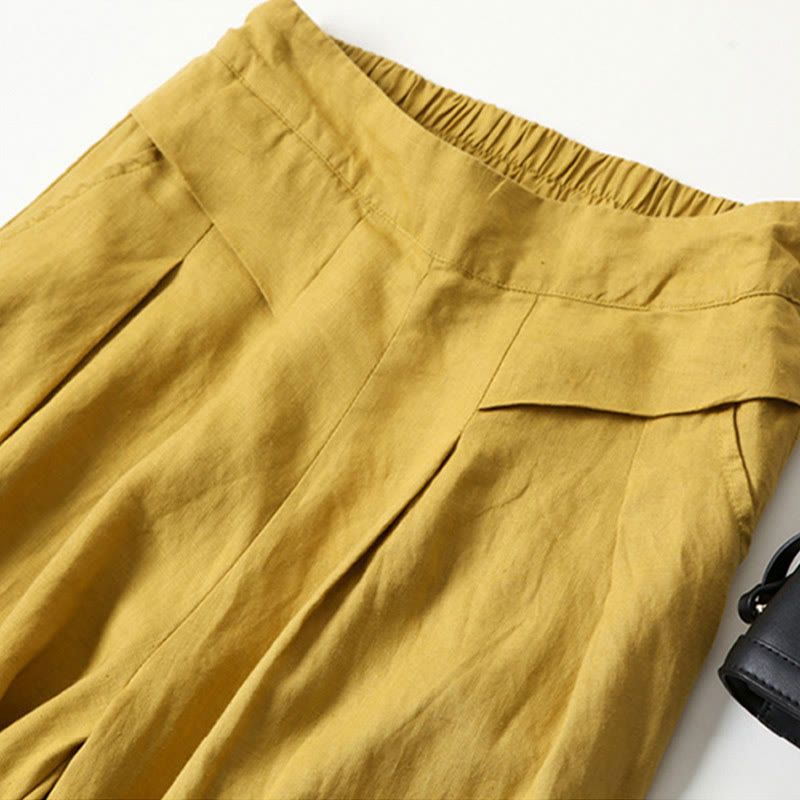 Stylish women's high-waisted wide-leg pants for comfortable modern workwear.