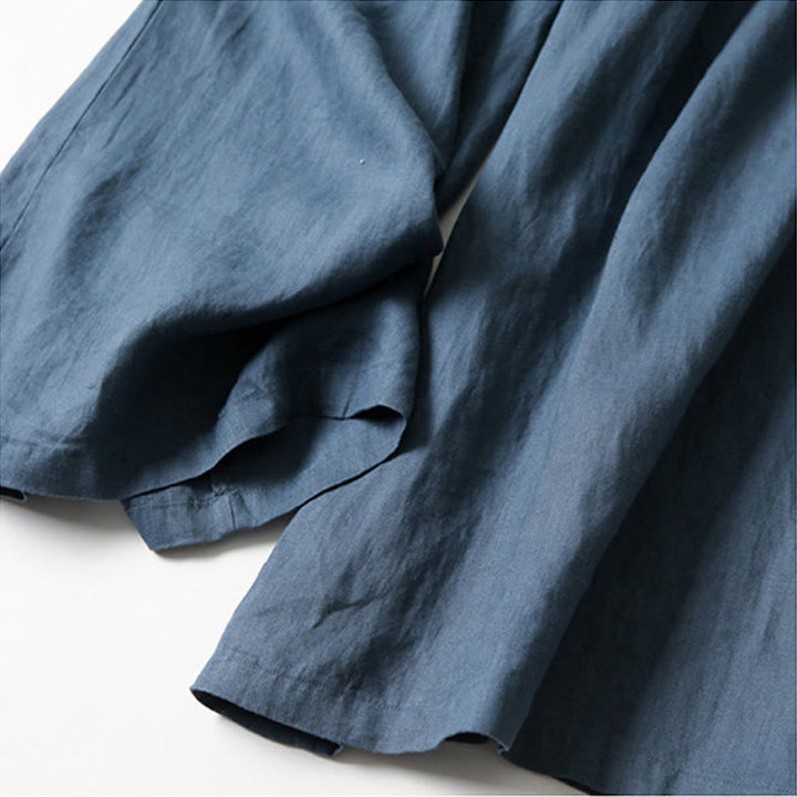 Women's workwear: chic high-waist wide-leg pants, comfortable for all-day wear.
