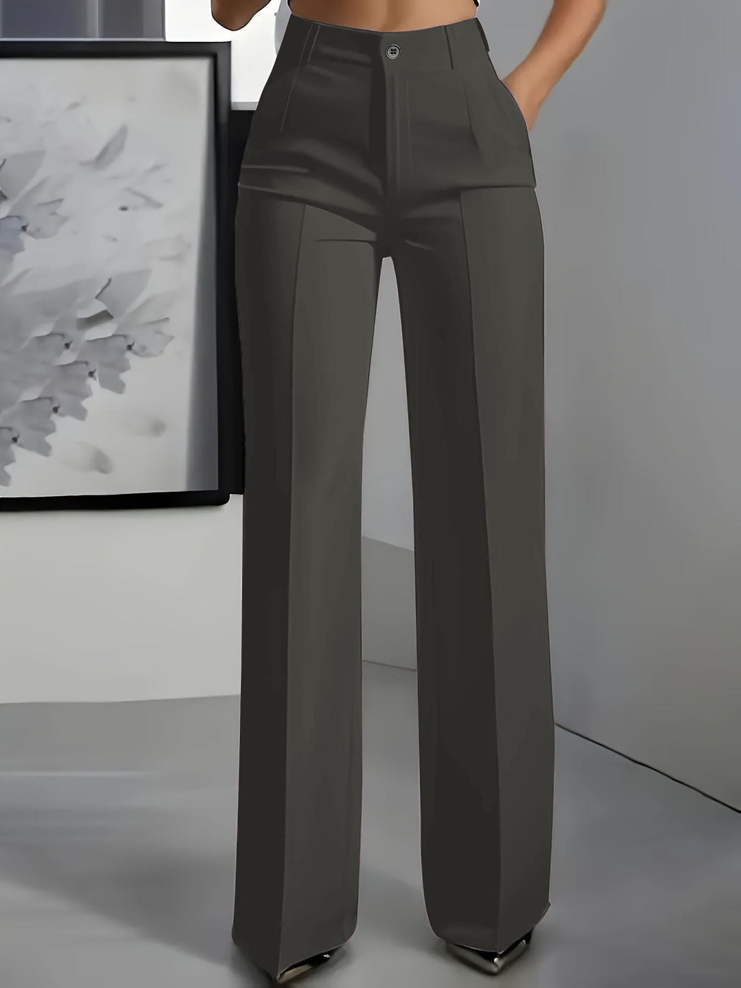 Elegant high waist wide leg trousers for women, featuring a flattering and fashionable silhouette. Office wear ready.