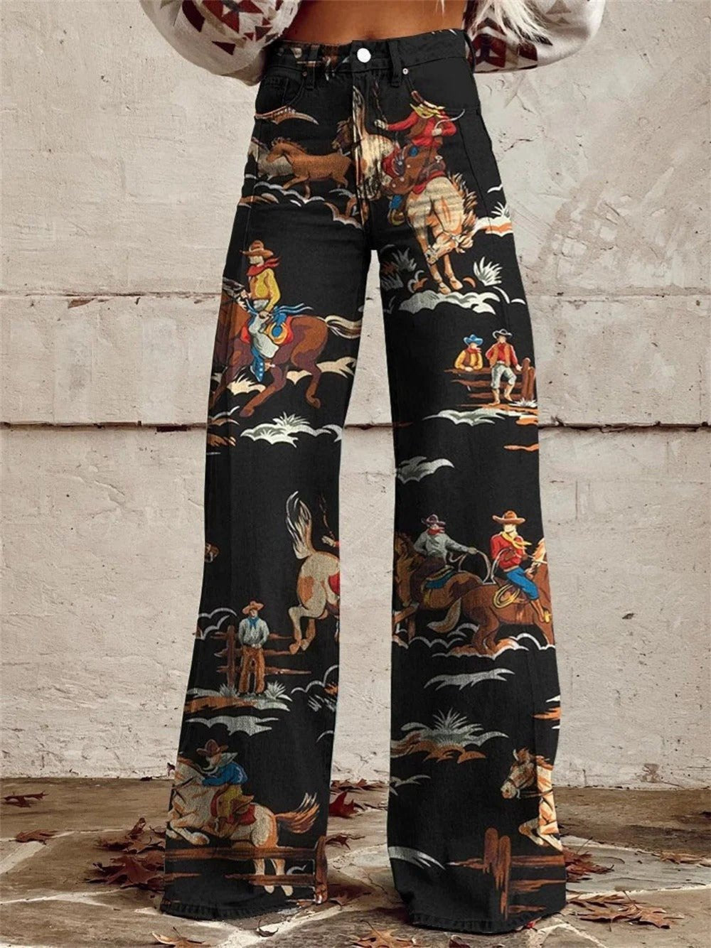 Women's high-waist wide-leg trousers with a bold Western cowboy print. Perfect for festival wear & casual chic.