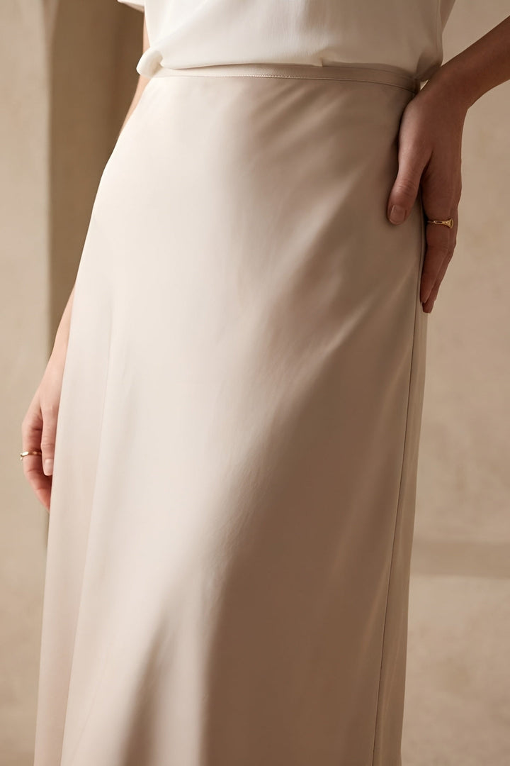 Effortlessly stylish women's high-waisted A-line midi skirt, comfortable for any fashion look.