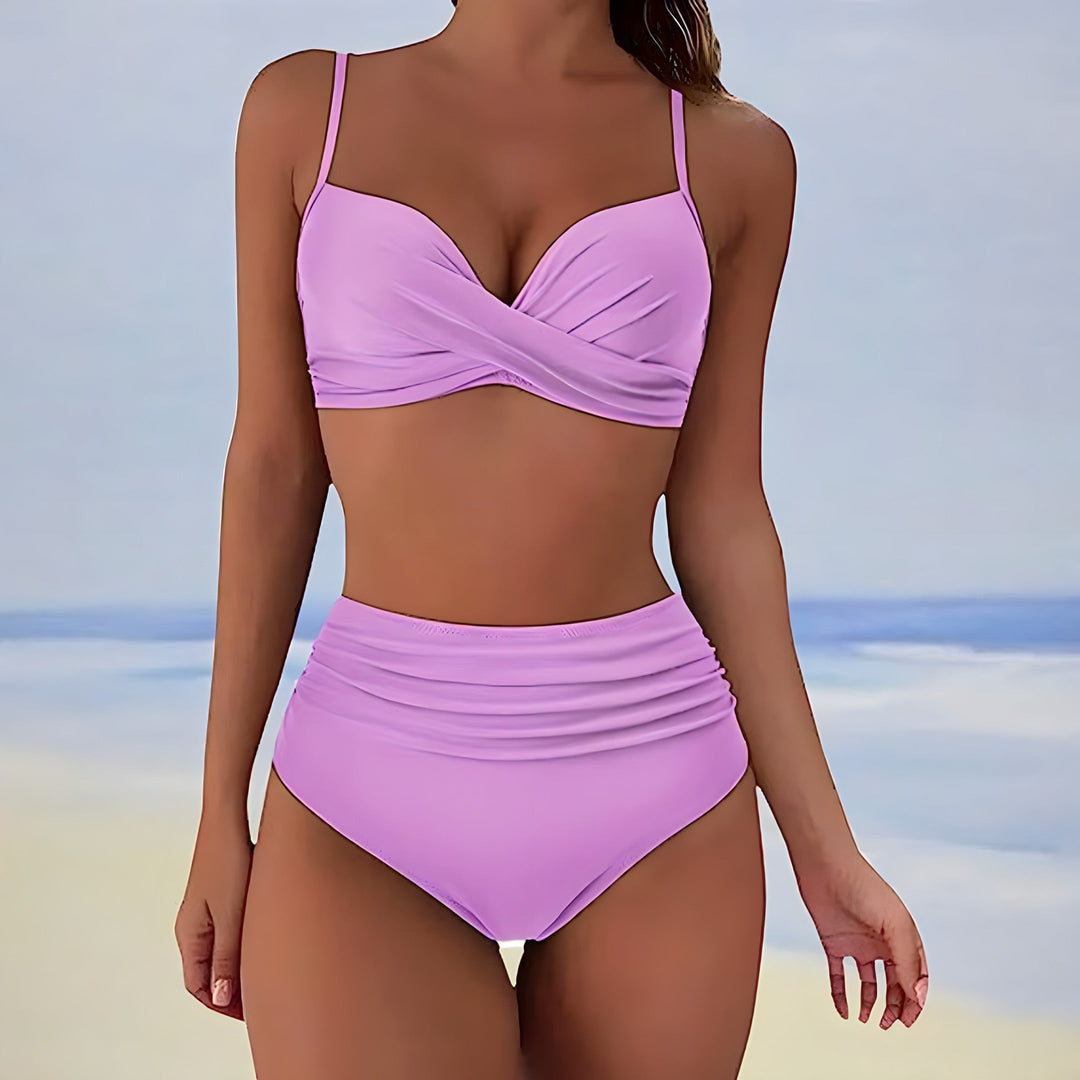 Fashionable high-waisted women's swimwear with a supportive twist front top, offering a flattering silhouette.
