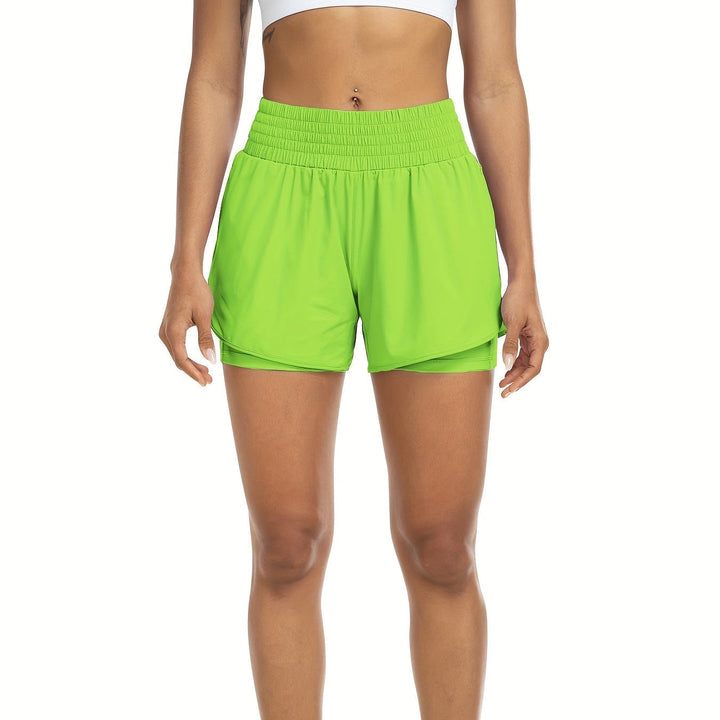 Essential women's high-waisted double-layer shorts for training, offering comfort & style for any workout.