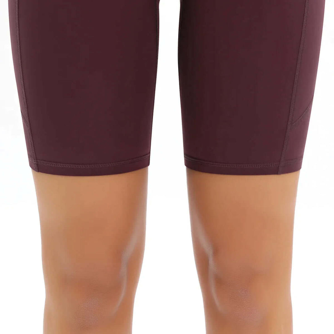 Premium women's active shorts, high-waisted with an essential pocket, providing flexibility and support for all activities.