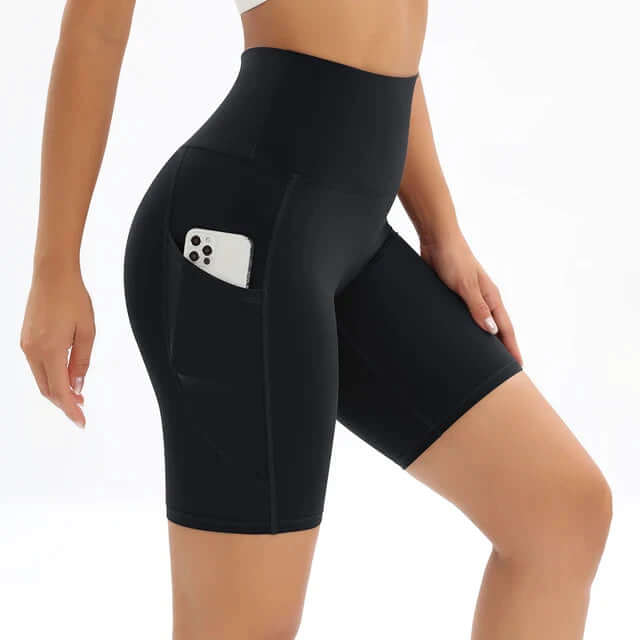 Athletic women's gym shorts with a high waist and discreet pocket, ideal for yoga, running, and fitness activities.
