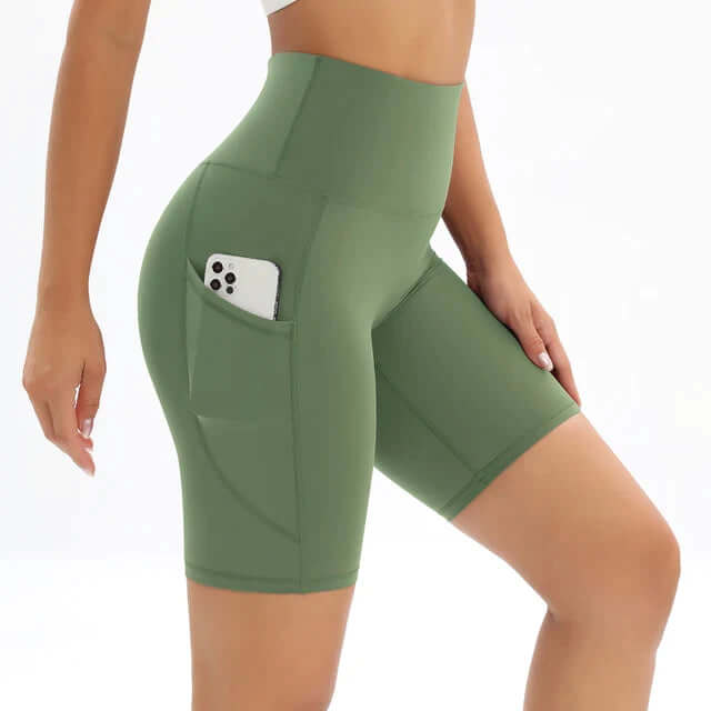 Performance women's running shorts, high-waisted with a side pocket, offering comfort and convenience for athletes.