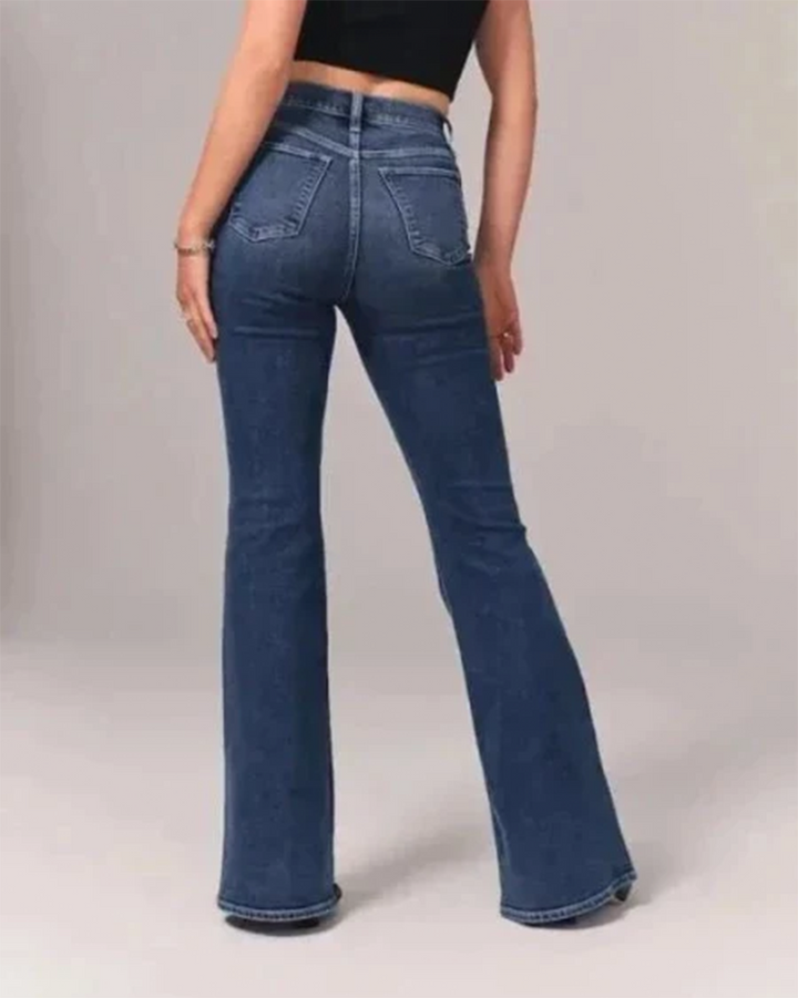 Light blue high-waisted flared jeans for women, offering a trendy retro look. Comfortable and stylish casual wear.