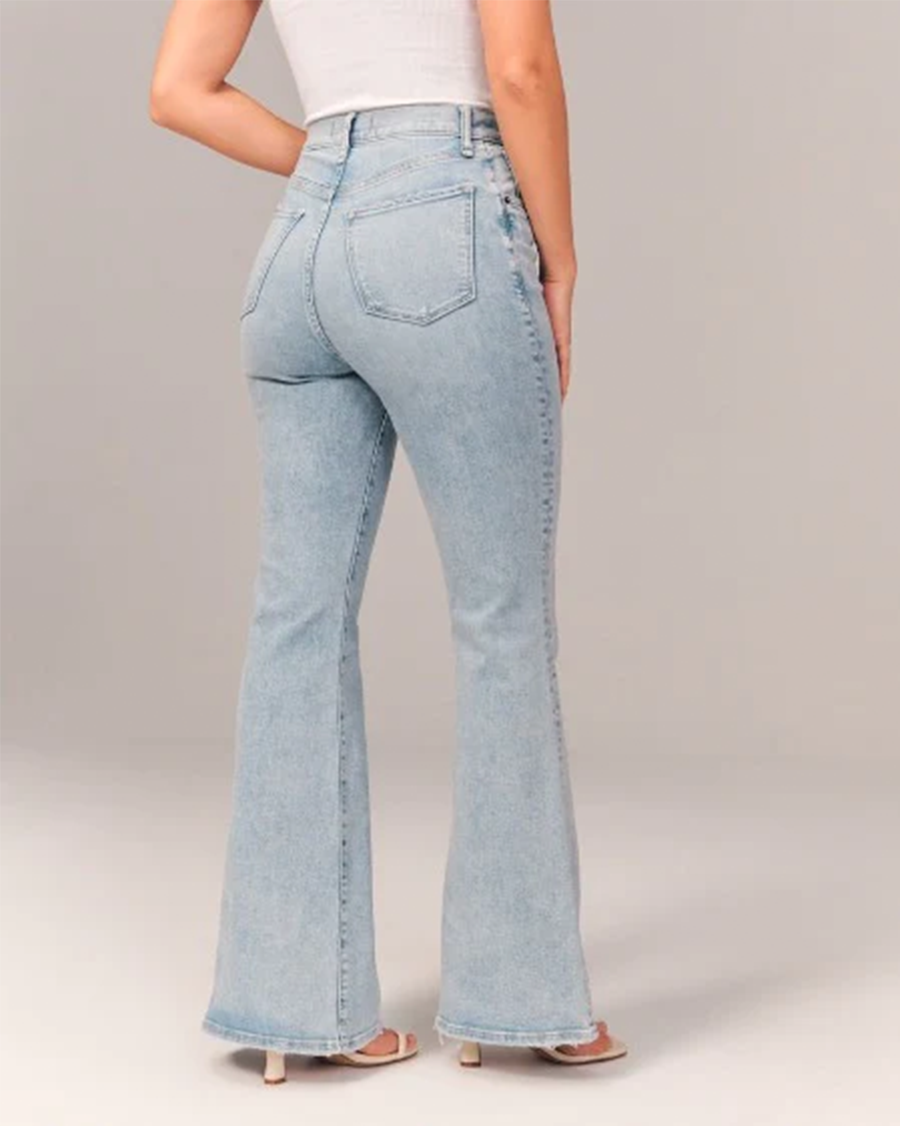 Chic women's high-waisted flared jeans. Elevate your casual wear with these versatile retro-style fashion trousers.