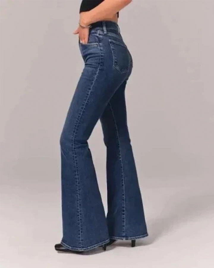 Comfortable women's high-waisted flared jeans in a classic retro style. Fashionable and flattering flare leg trousers.