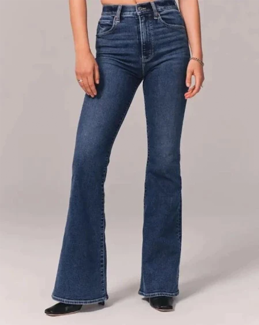 Stylish women's high-waisted flared jeans, a must-have for a chic wardrobe. Trendy retro-inspired fashion trousers.