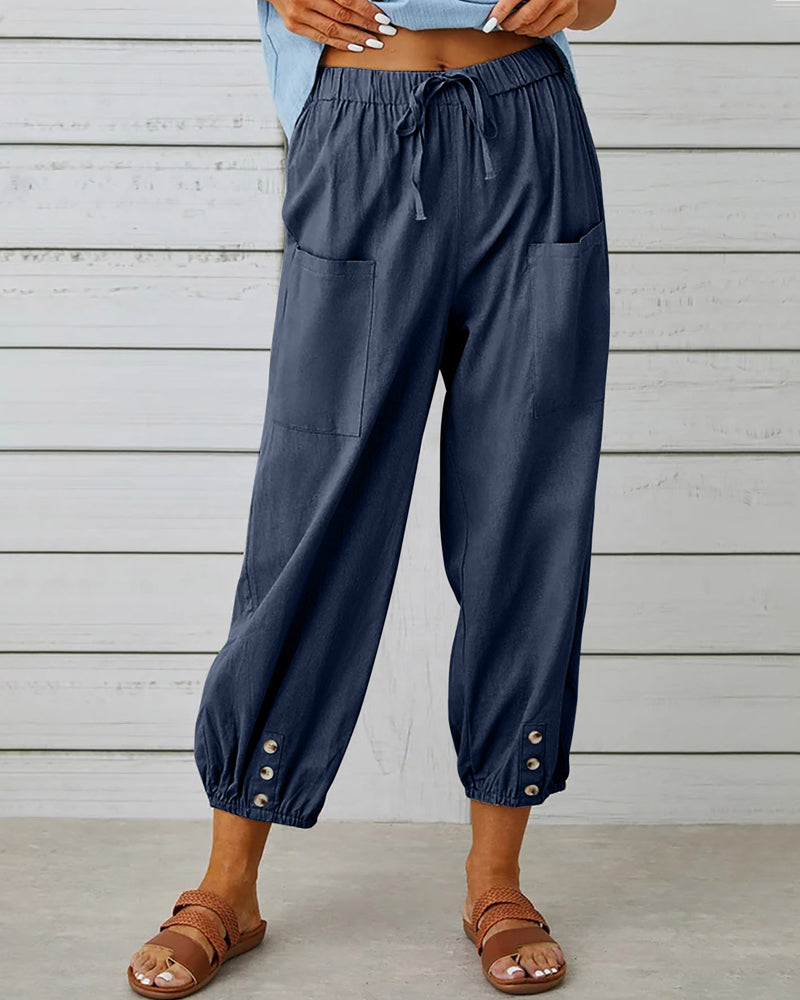 Women's high-waisted loose fit casual pants in a relaxed style, perfect for comfortable everyday wear.