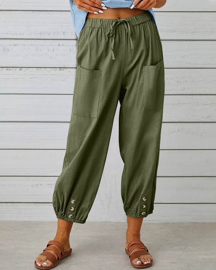 Relaxed summer fashion: women's high-waisted loose fit casual pants, comfortable & versatile for warm weather.