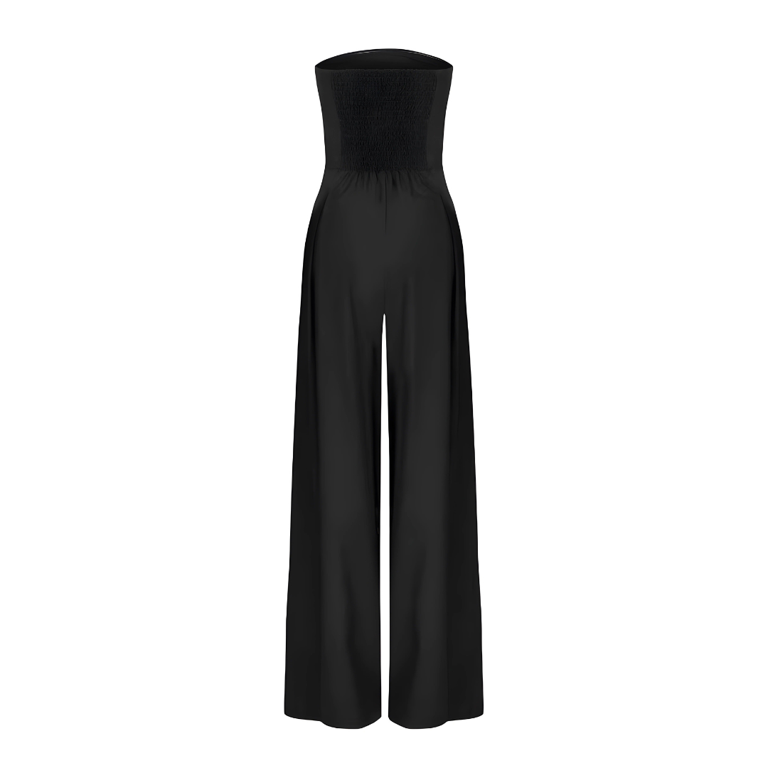 Elegant women's strapless wide leg jumpsuit with a high waist & functional pockets. Perfect for evening.