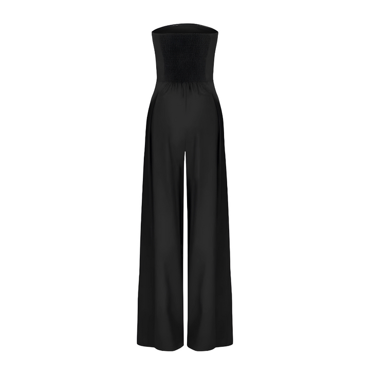 Elegant women's strapless wide leg jumpsuit with a high waist & functional pockets. Perfect for evening.