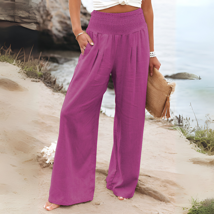 Women's high-waisted stretch linen trousers, offering ultimate comfort for casual or elegant wear.