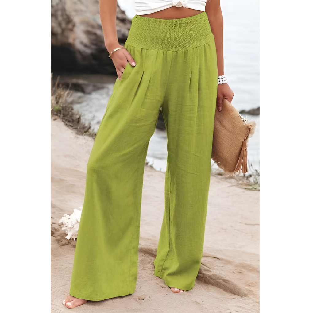 Breathable women's linen trousers, high-waisted & stretchy, perfect for comfortable summer fashion.