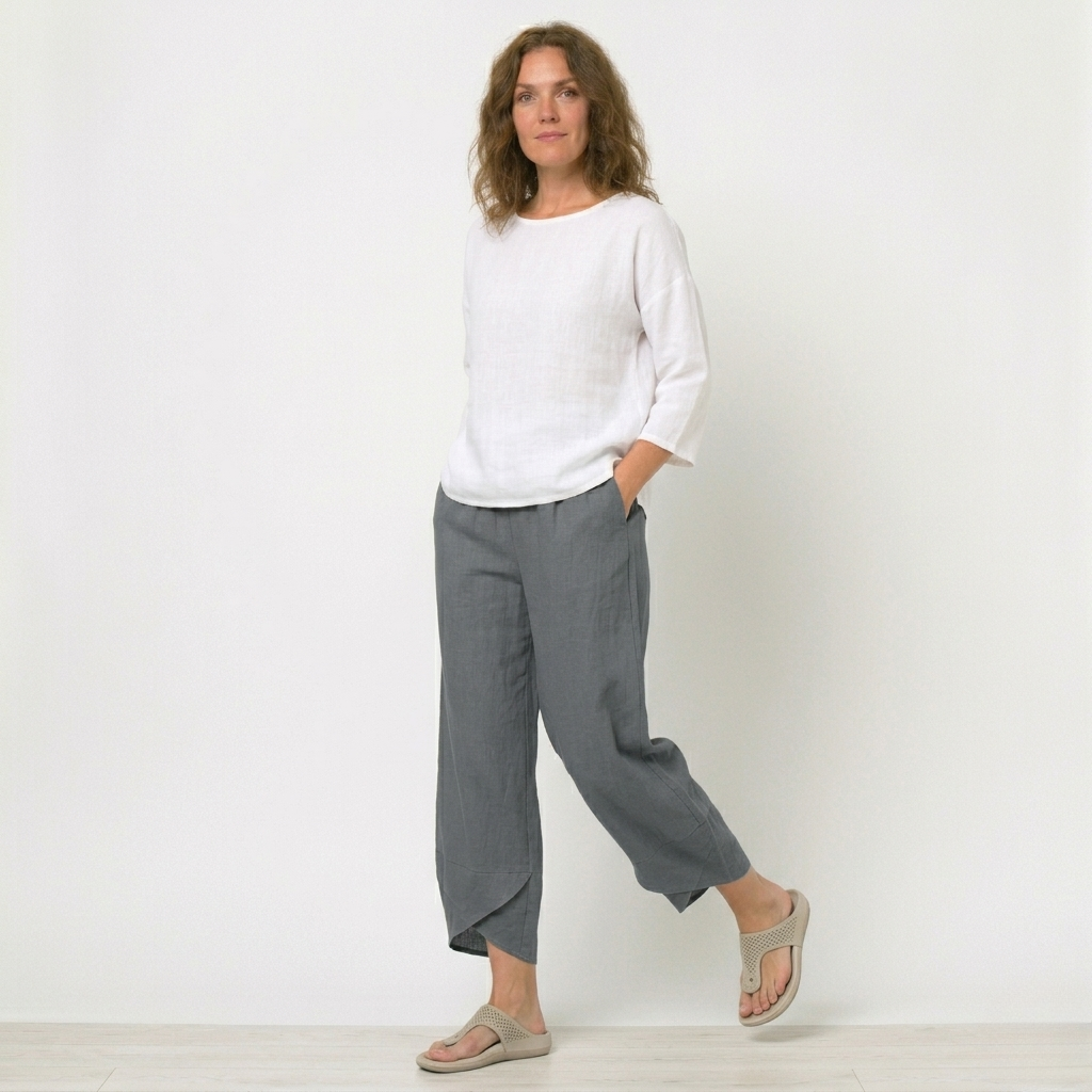 Stylish women's high-waisted trousers with a flattering tulip hem design, modern and chic fashion.