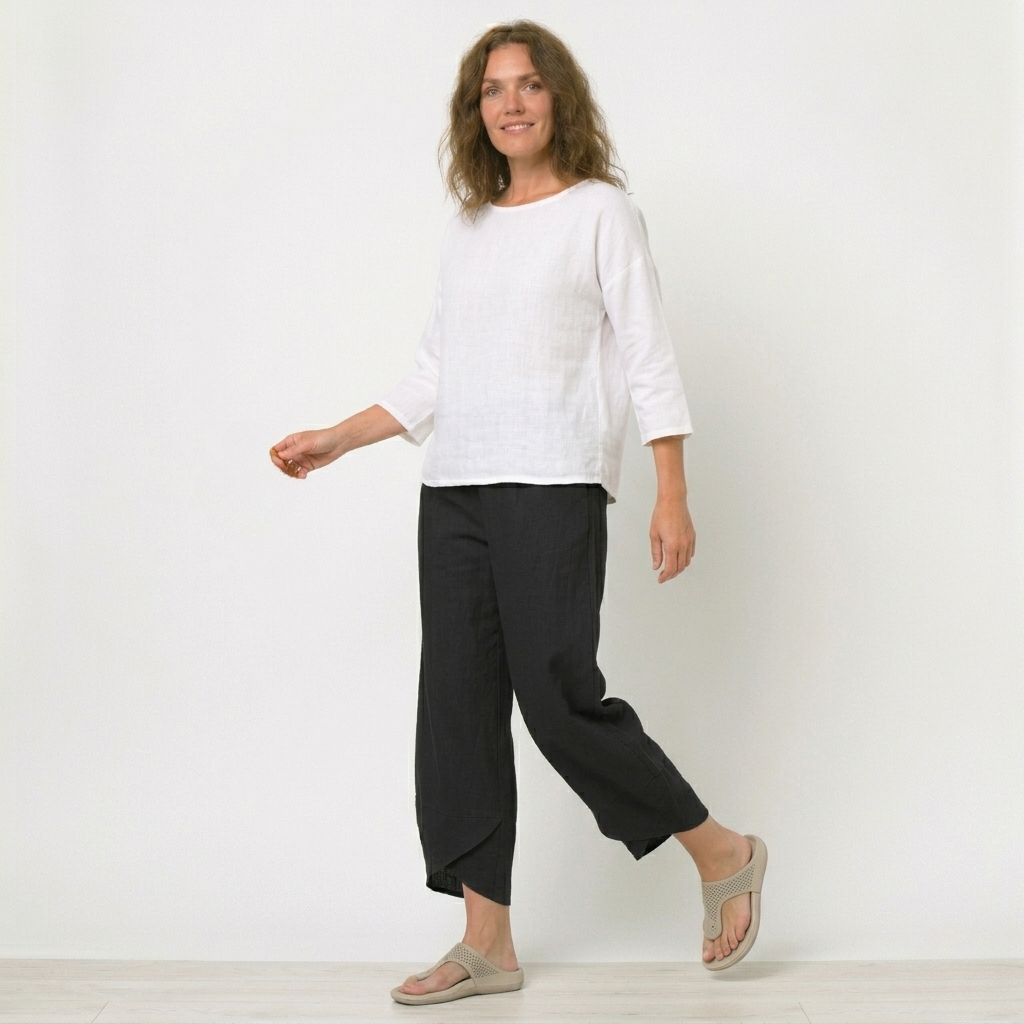 Modern women's high-waisted trousers with a stylish tulip hem. Perfect comfortable fashion pants.