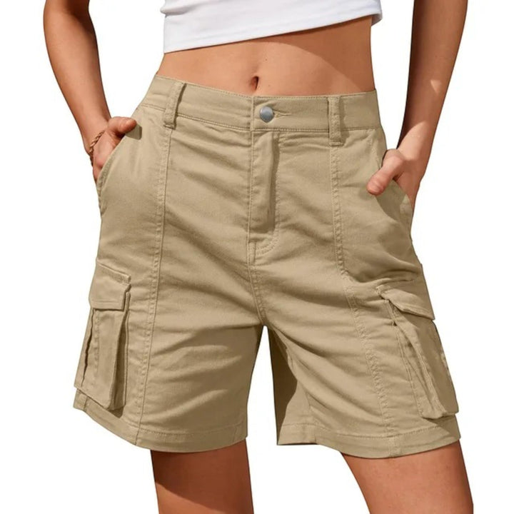 Side view of women's vintage high-waisted cargo shorts, showcasing multiple utility pockets & casual fit.