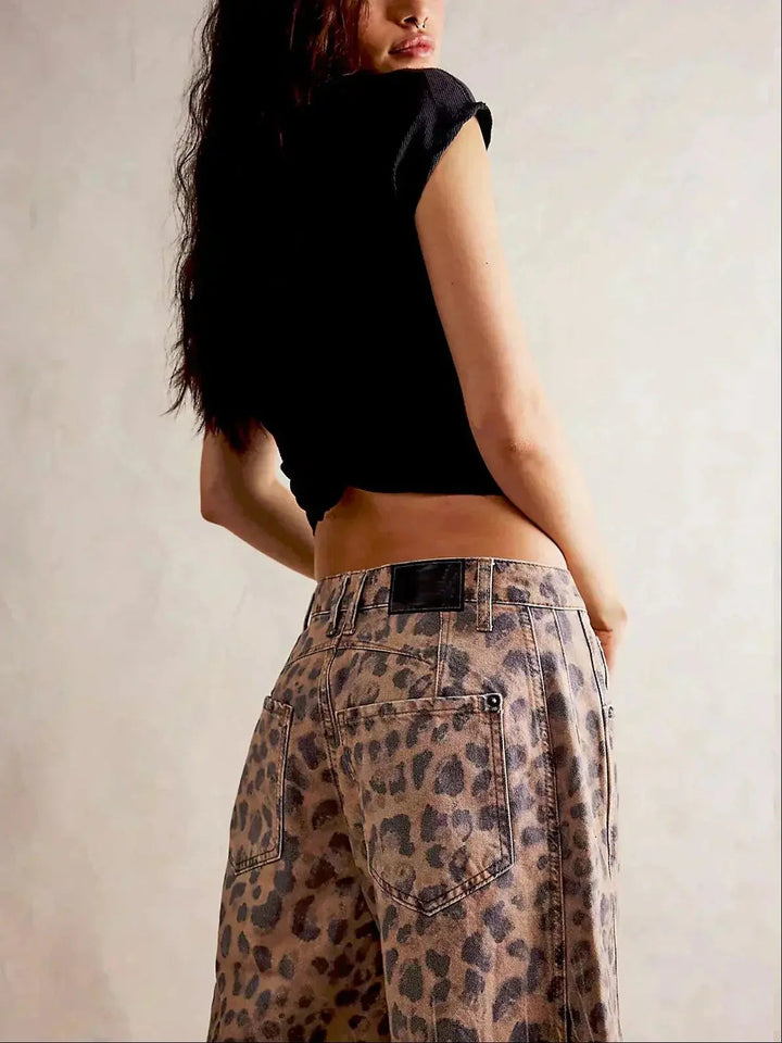 Women's animal print wide leg jeans, high waisted for a trendy look.