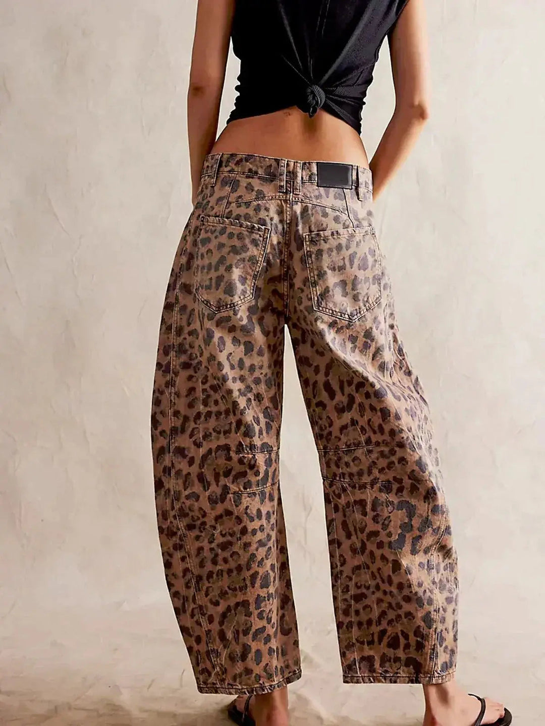 Women's trendy leopard print wide leg jeans, high waisted for comfort.