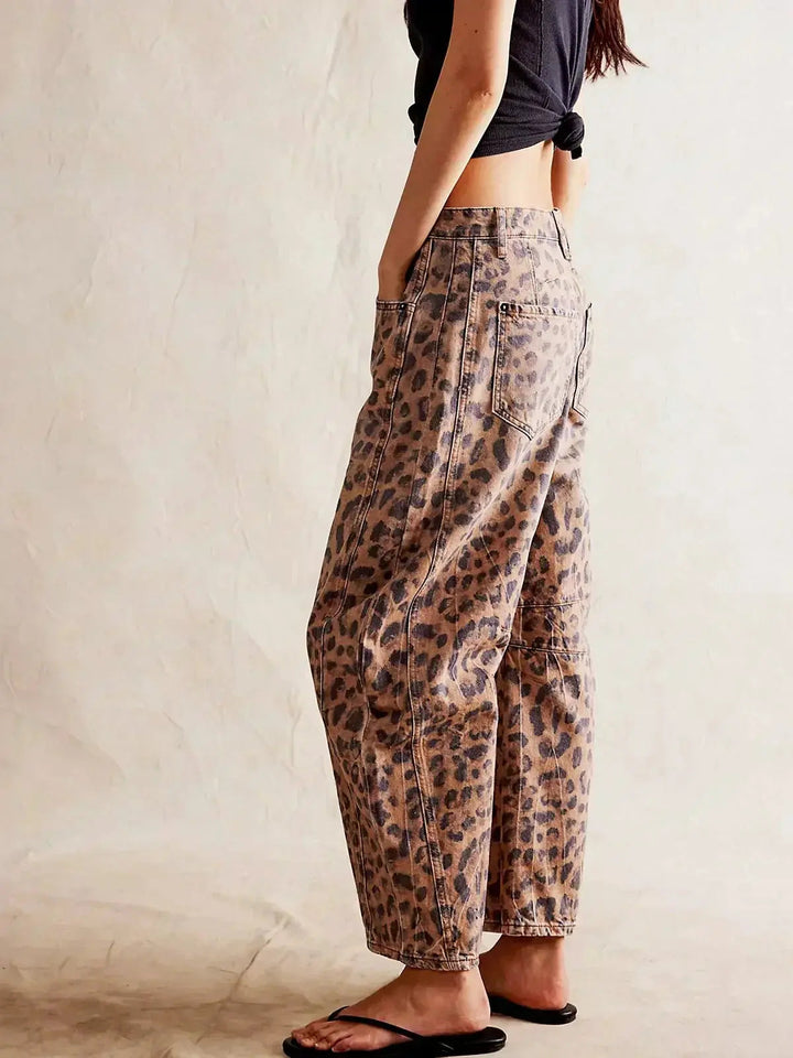 High-rise wide leg animal print jeans for women, fashionable statement.