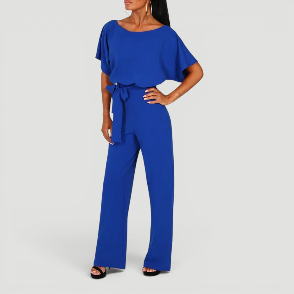 Women's high waisted wide leg jumpsuit with a chic belt, enhancing the elegant silhouette & style.