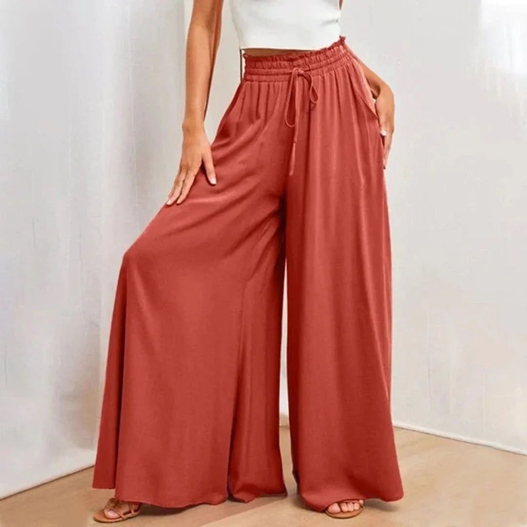 Casual women's wide leg pants, high-waisted with a comfortable smocked drawstring, ideal for everyday.
