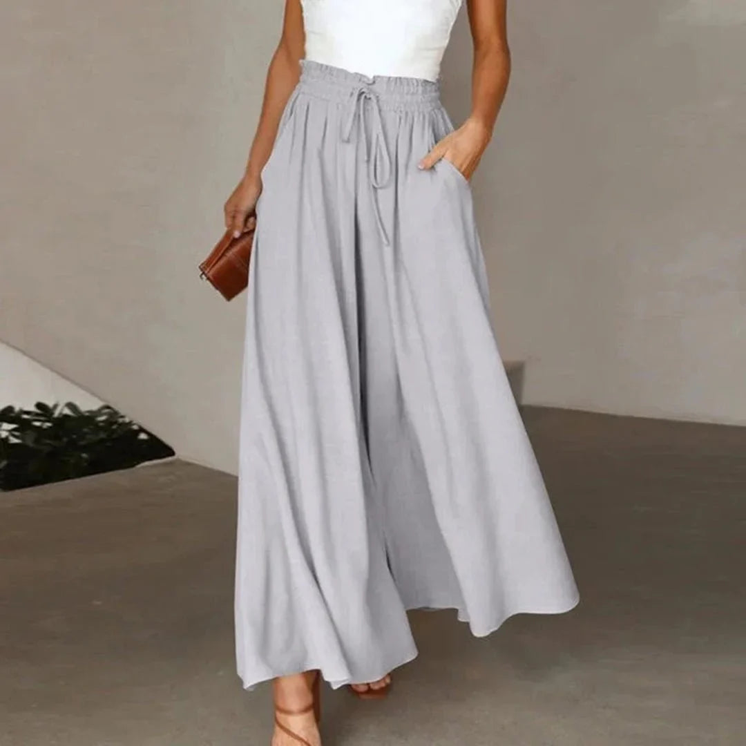 Versatile women's high-waist wide leg pants, smocked drawstring provides a comfortable, flattering fit.