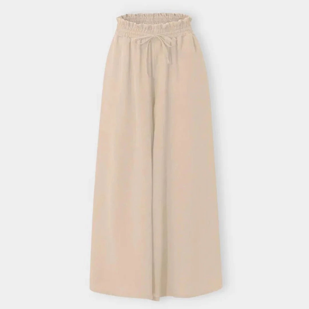 Fashionable women's wide leg pants, high waist and smocked drawstring offer style and ultimate comfort.