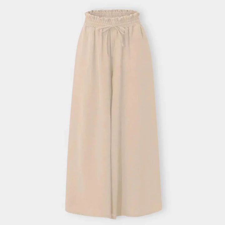Fashionable women's wide leg pants, high waist and smocked drawstring offer style and ultimate comfort.