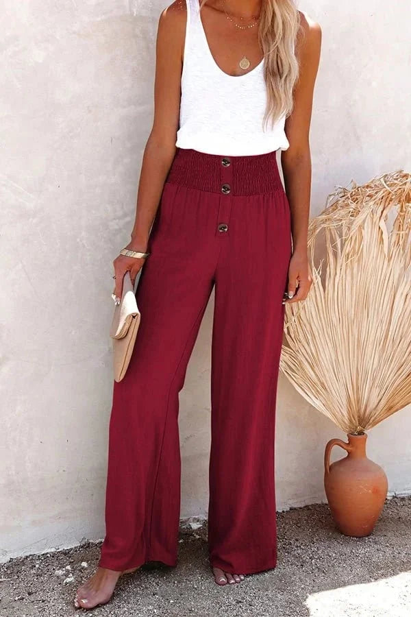 Breathable women's summer wide-leg trousers, high-waisted and comfortable with a smocked front design.