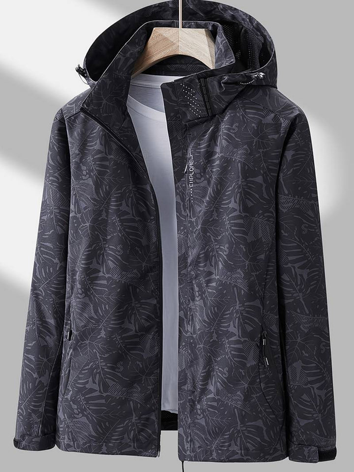 Durable women's hooded jacket. Water & wind resistant outerwear, ideal for protection during spring and fall outdoor activities.