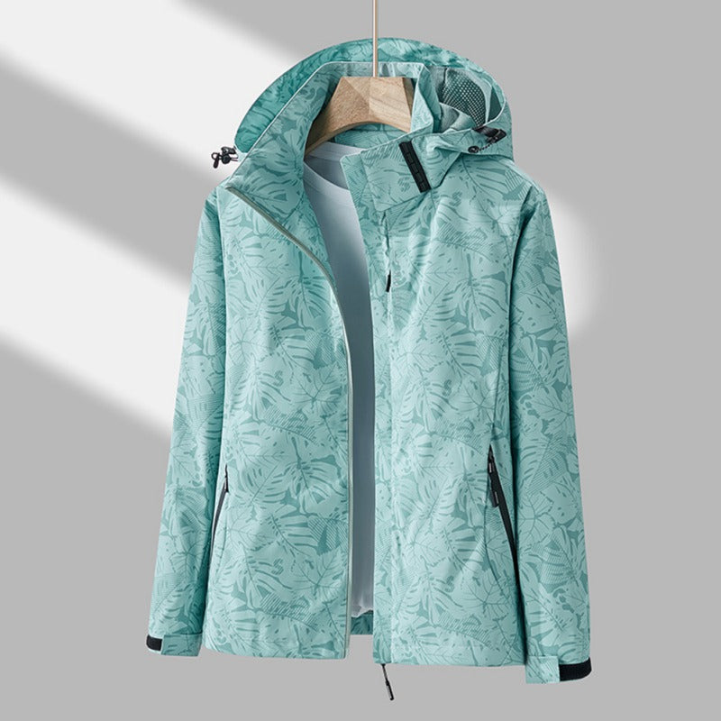 Versatile women's windproof & water-resistant hooded jacket. Essential lightweight outerwear for outdoor adventures.