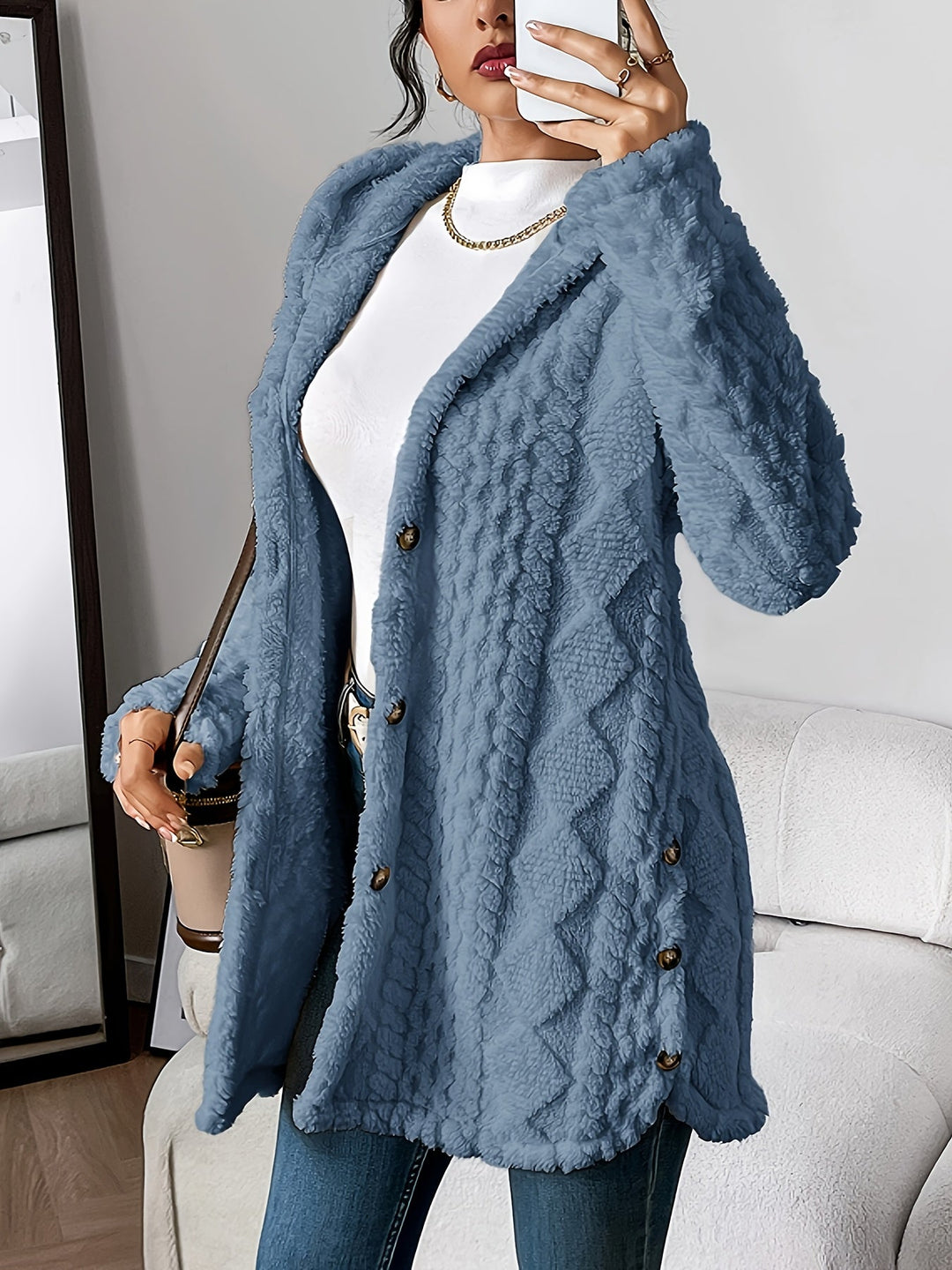 Stylish women's hooded longline cardigan, oversized fit, great for casual fall fashion.
