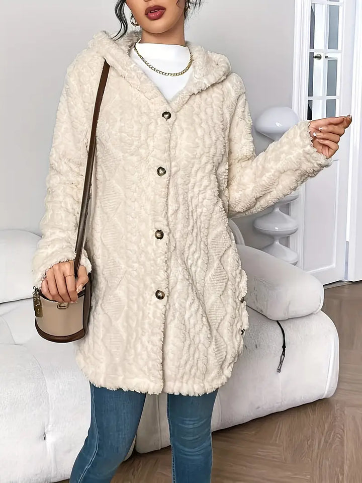 Elegant longline hooded cardigan for women, button-up design, adds cozy style.