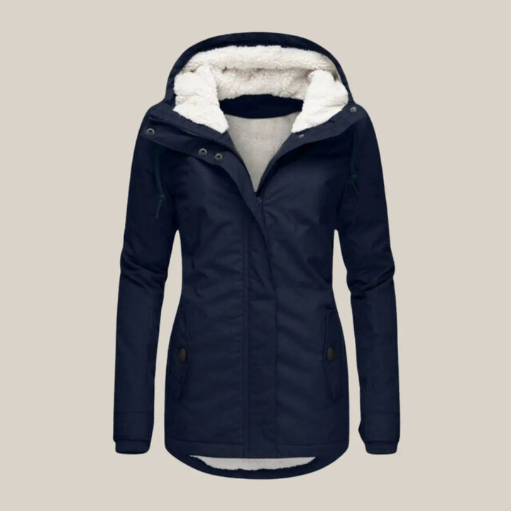 Women's hooded quilted winter jacket, fleece-lined for warmth. Stylish cold weather outerwear.