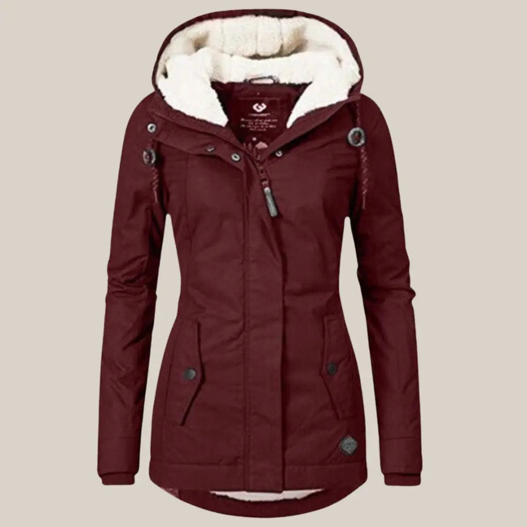 Versatile women's hooded quilted jacket. Stylish outerwear for cold autumn & winter seasons.