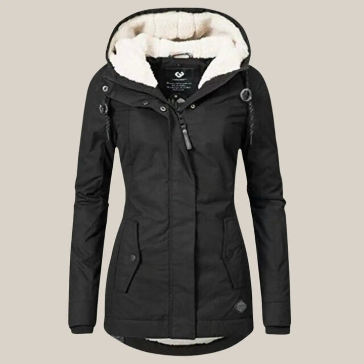 Warm women's quilted winter jacket with hood. Ideal for cold weather & autumn fashion.