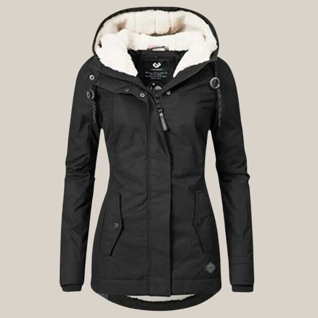 Practical women's hooded quilted winter coat. Durable outerwear for cold weather protection.