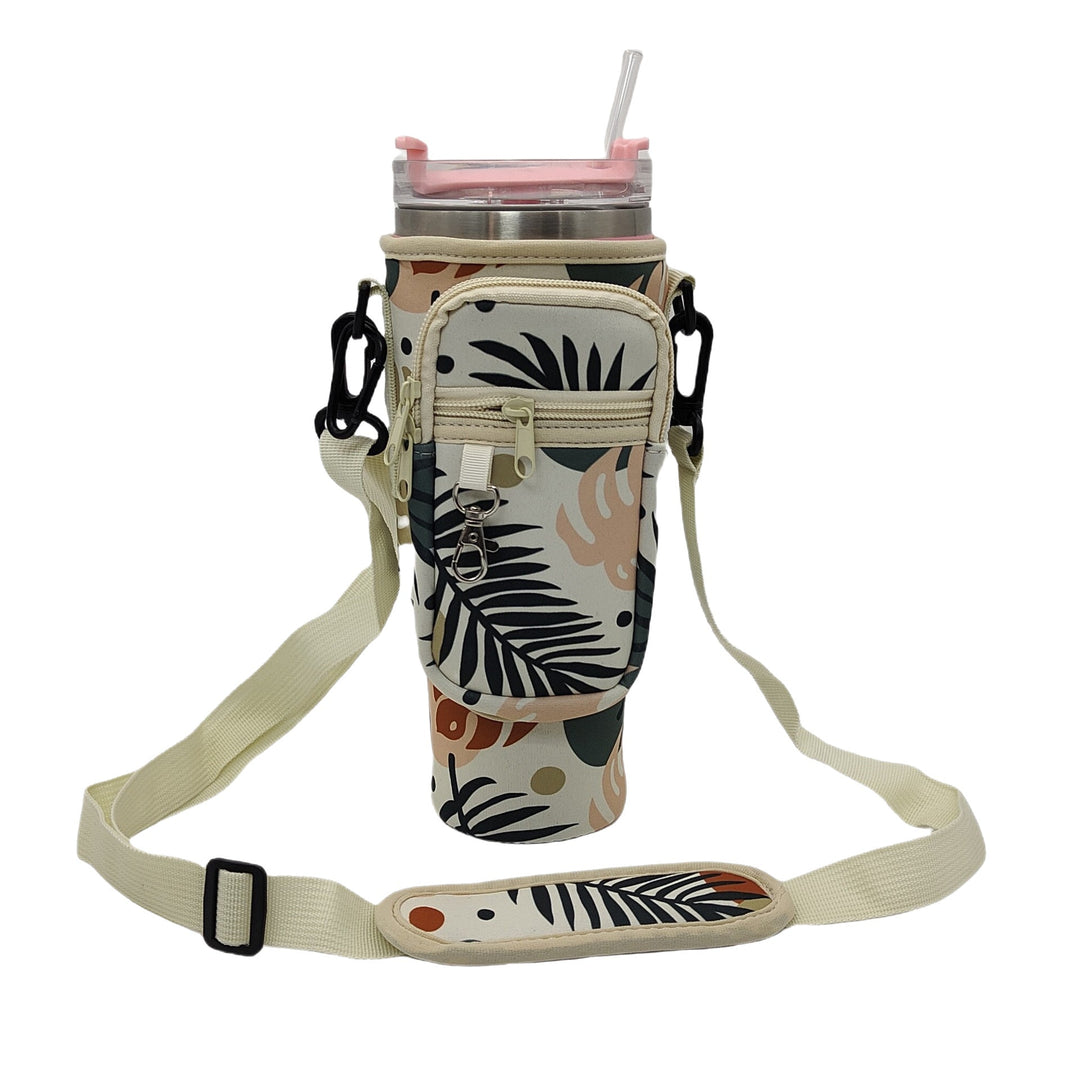 Pink insulated water bottle with versatile shoulder strap carry bag for active women.
