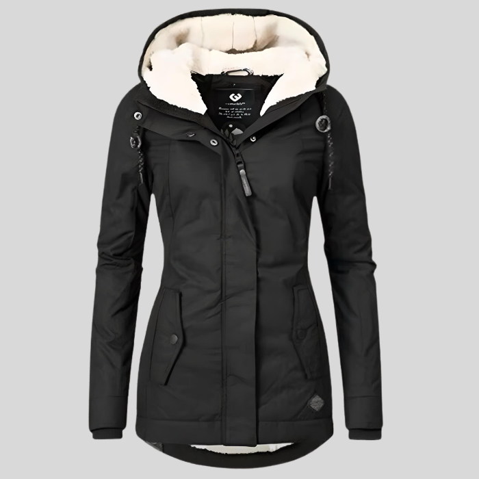 Stylish women's longline insulated waterproof winter coat, cozy and warm for winter fashion.