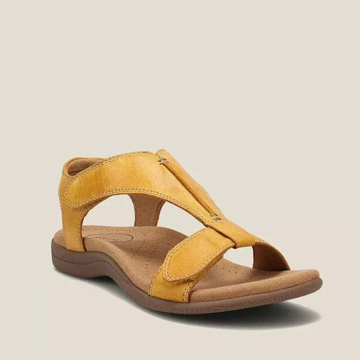 Casual women's open toe flat sandals with adjustable straps for summer comfort and relaxed style.